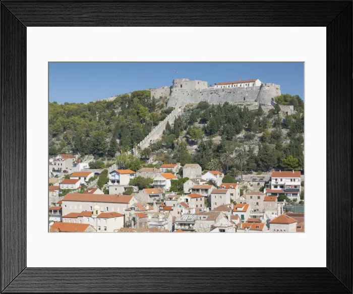 Framed Print : View of Hvar Main Square overlooked by Spanish Fortress, Hvar, Hvar Island, Dalmatia Framed Print : View of Hvar Main Square overlooked by Spanish Fortress, Hvar, Hvar Island, Dalmatia