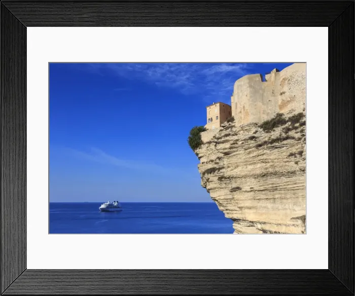 Framed Print : Old citadel atop cliffs with cruise ship anchored off shore, Bonifacio, Corsica, France Framed Print : Old citadel atop cliffs with cruise ship anchored off shore, Bonifacio, Corsica, France