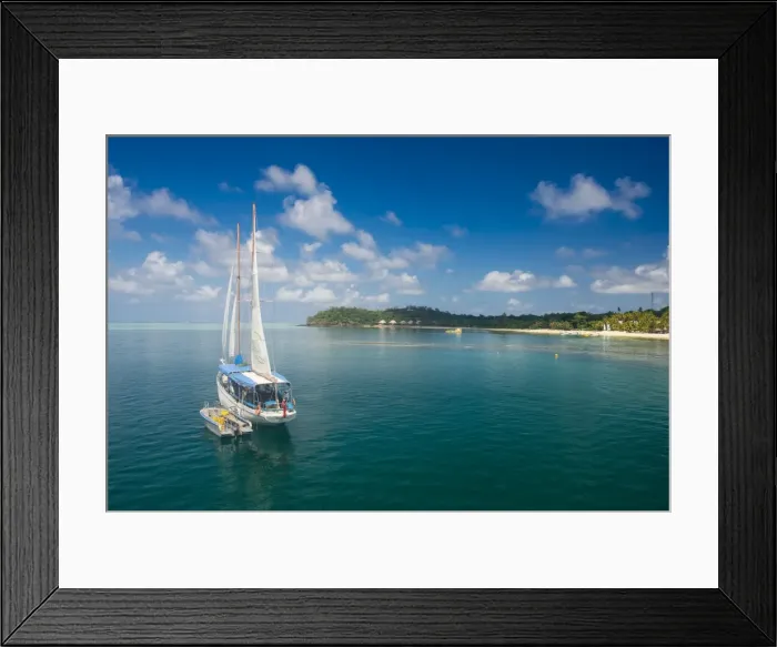 Framed Print : Sailing boat anchoring on Mana Island, Mamanuca Islands, Fiji, South Pacific Framed Print : Sailing boat anchoring on Mana Island, Mamanuca Islands, Fiji, South Pacific