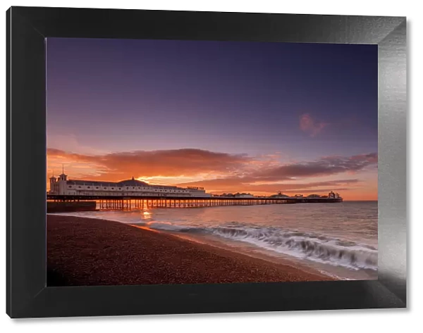 Brighton Pier and beach at sunrise, Brighton, East Sussex, Sussex, England, United Kingdom