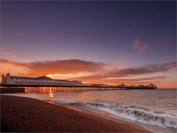 Brighton Pier and beach at sunrise, Brighton, East Sussex, Sussex, England, United Kingdom