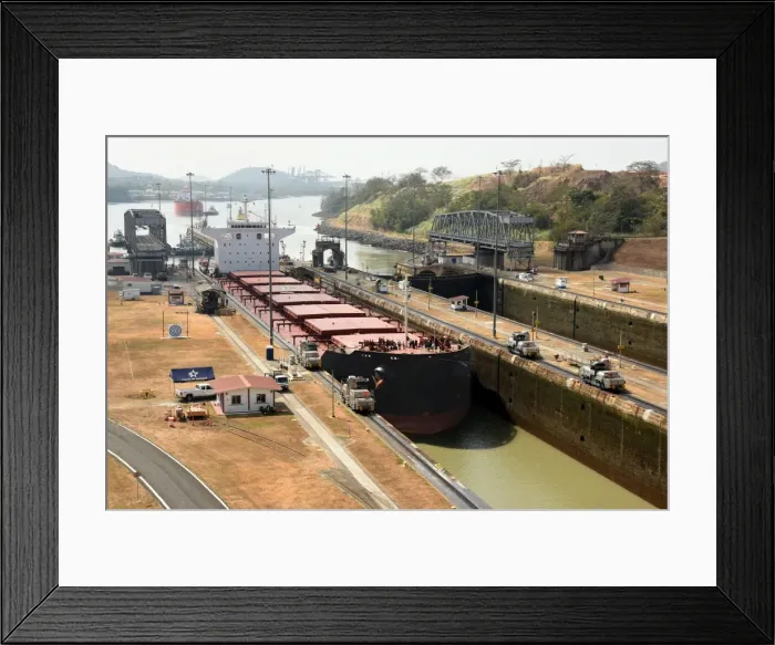 Framed Print : Electric mules guiding Panamax ship through Miraflores Locks on the Panama Canal Framed Print : Electric mules guiding Panamax ship through Miraflores Locks on the Panama Canal