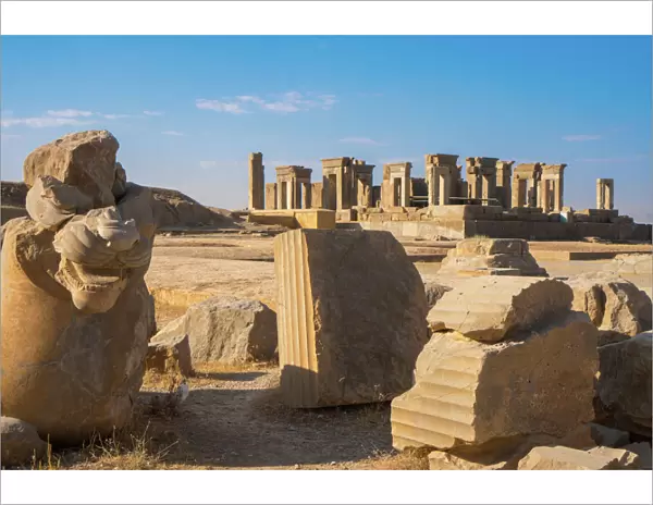 Broken bull column in foreground, Persepolis, UNESCO World Heritage Site, Iran, Middle