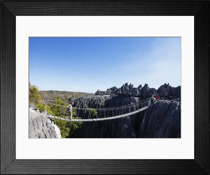 Framed Print : Tourist crossing a rope bridge, Grand Tsingy, Tsingy du Bemaraha National Park, UNESCO Framed Print : Tourist crossing a rope bridge, Grand Tsingy, Tsingy du Bemaraha National Park, UNESCO