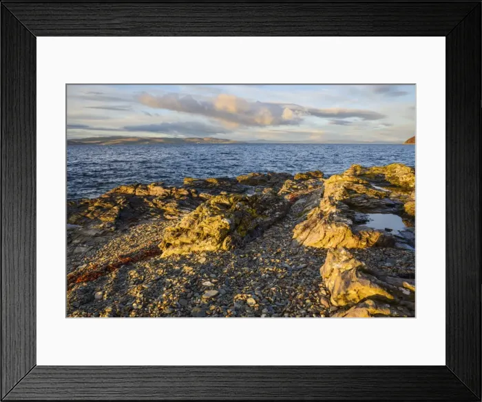 Framed Print : Rocky shore near Catacol looking out across the Kilbrannan Sound to Mull of Kintyre Framed Print : Rocky shore near Catacol looking out across the Kilbrannan Sound to Mull of Kintyre