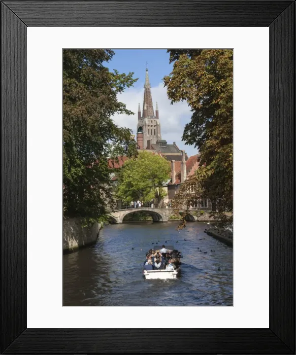 Framed Print : Bridge to Begijnhof, and spire of Church of Our Lady, tourist launch, Bruges, UNESCO Framed Print : Bridge to Begijnhof, and spire of Church of Our Lady, tourist launch, Bruges, UNESCO