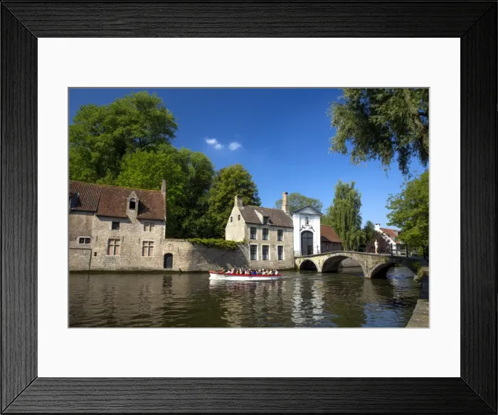 Framed Print : Tourist boat, at the Minnewater Lake and Begijnhof Bridge with entrance to Beguinage Framed Print : Tourist boat, at the Minnewater Lake and Begijnhof Bridge with entrance to Beguinage