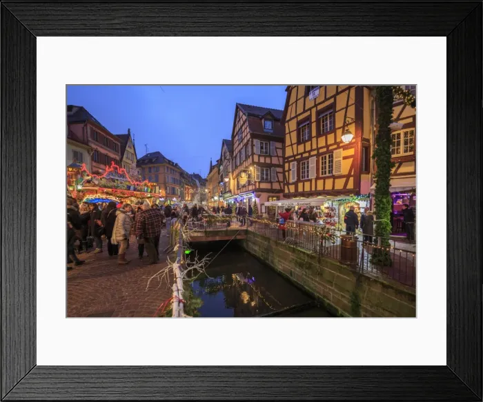 Framed Print : Tourists shopping at the Christmas Markets in the old medieval town of Colmar, Haut-Rhin department Framed Print : Tourists shopping at the Christmas Markets in the old medieval town of Colmar, Haut-Rhin department
