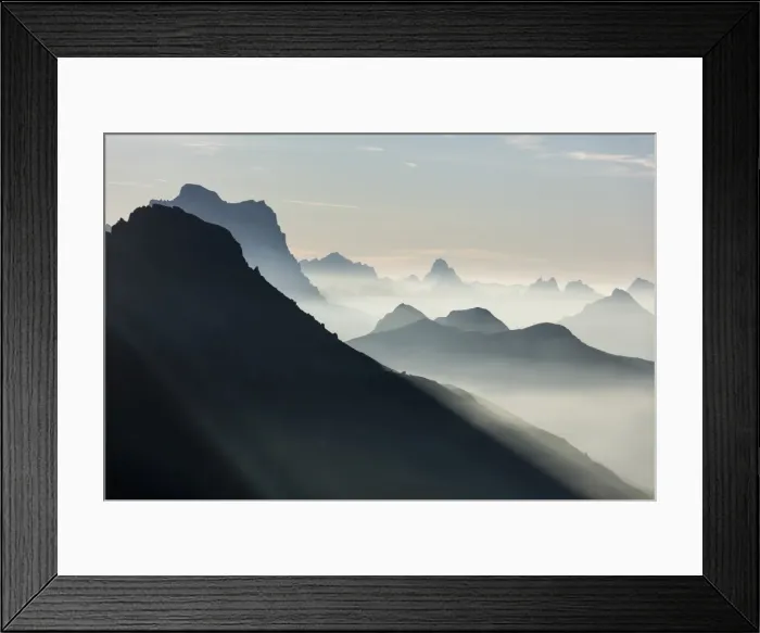 Framed Print : Mist on peaks of Dolomites and Monte Pelmo seen from Cima Belvedere at dawn, Val di Fassa Framed Print : Mist on peaks of Dolomites and Monte Pelmo seen from Cima Belvedere at dawn, Val di Fassa