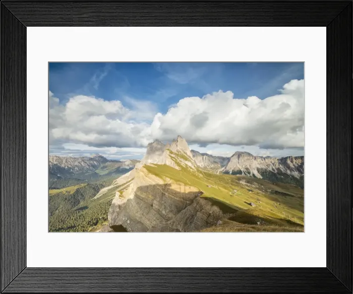 Framed Print : Blue sky and clouds on the rocky peaks of the Odle mountain range seen from Seceda Framed Print : Blue sky and clouds on the rocky peaks of the Odle mountain range seen from Seceda