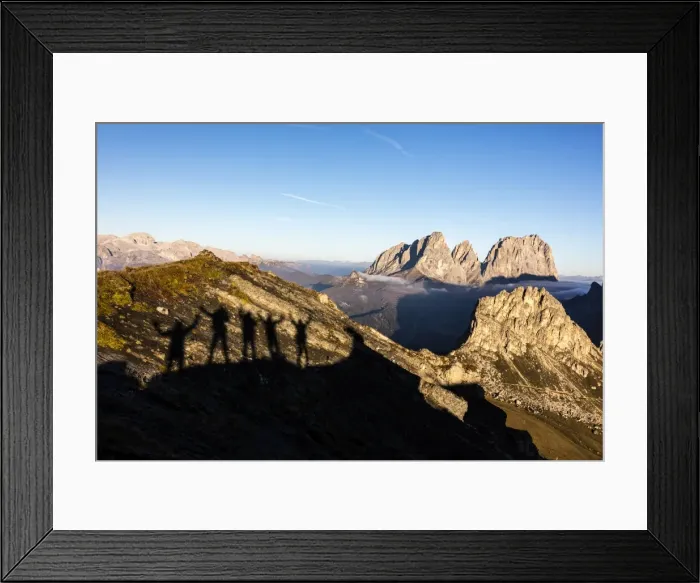Framed Print : Silhouettes of hikers frame Sass Beca and Sassolungo from Cima Belvedere, Canazei Framed Print : Silhouettes of hikers frame Sass Beca and Sassolungo from Cima Belvedere, Canazei