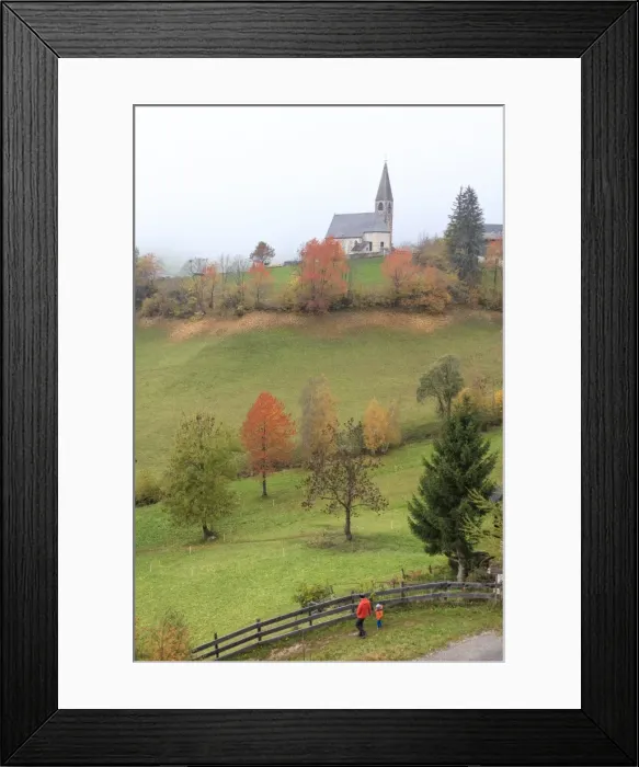 Framed Print : Mist and colourful trees surround the alpine church in the fall, St. Magdalena, Funes Valley Framed Print : Mist and colourful trees surround the alpine church in the fall, St. Magdalena, Funes Valley