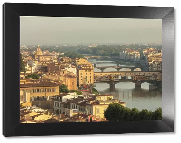 View of the medieval city of Florence with the typical Ponte Vecchio on Arno River