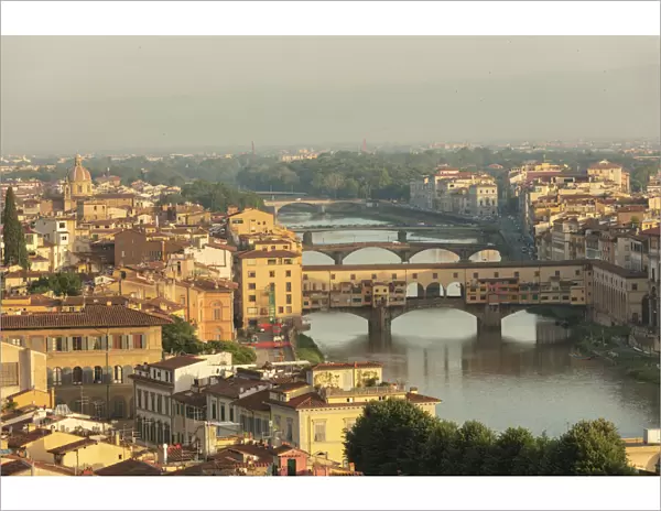 View of the medieval city of Florence with the typical Ponte Vecchio on Arno River