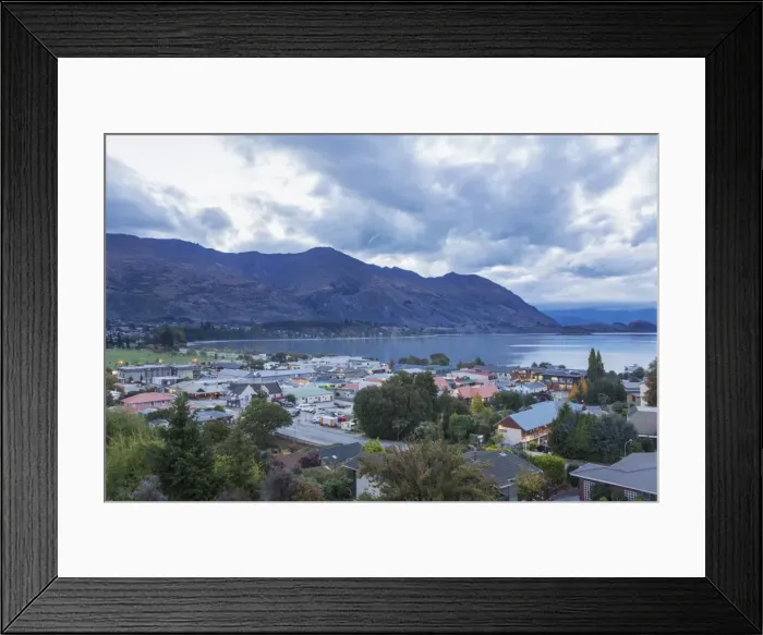 Framed Print : View over rooftops to Lake Wanaka at dusk, Wanaka, Queenstown-Lakes district, Otago Framed Print : View over rooftops to Lake Wanaka at dusk, Wanaka, Queenstown-Lakes district, Otago