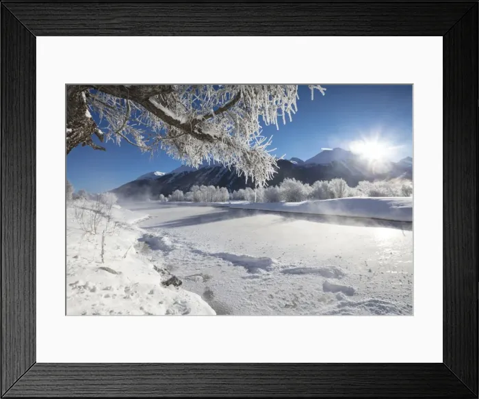 Framed Print : Frost on trees frame the snowy landscape and frozen river, Inn, Celerina, Maloja Framed Print : Frost on trees frame the snowy landscape and frozen river, Inn, Celerina, Maloja