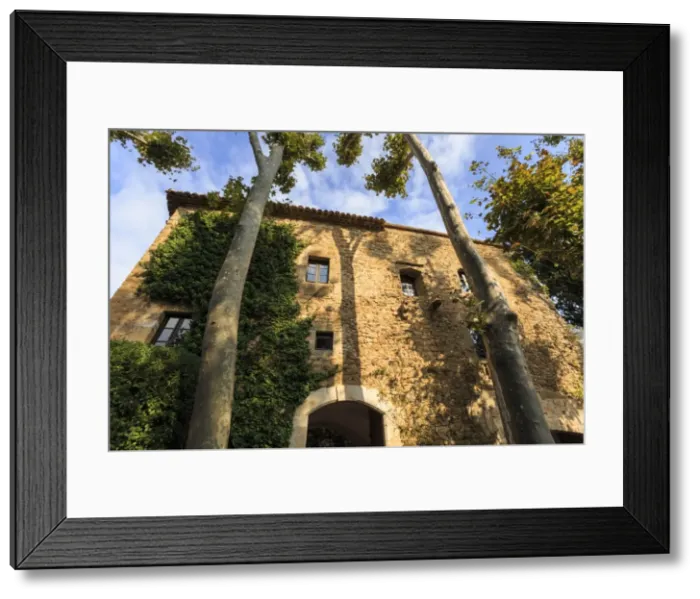 Framed Print : Gala Dali Castle Museum facade amidst tall trees, medieval home of Salvador Dali Framed Print : Gala Dali Castle Museum facade amidst tall trees, medieval home of Salvador Dali