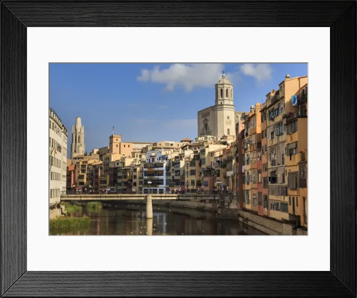 Framed Print : Cathedral towers above distinctive historic colourful arcaded houses and Onyar River Framed Print : Cathedral towers above distinctive historic colourful arcaded houses and Onyar River