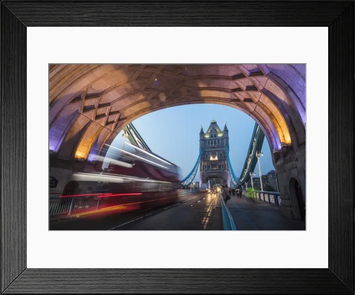 Framed Print : Lights on Tower Bridge over the River Thames with a typical double decker bus, London Framed Print : Lights on Tower Bridge over the River Thames with a typical double decker bus, London