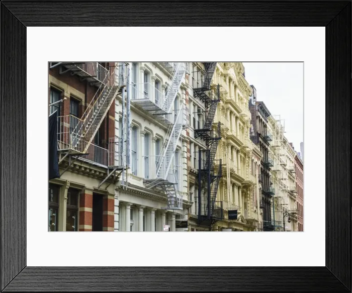 Framed Print : Old buildings and fire escapes in the Cast Iron District of SoHo, Manhattan, New York City Framed Print : Old buildings and fire escapes in the Cast Iron District of SoHo, Manhattan, New York City