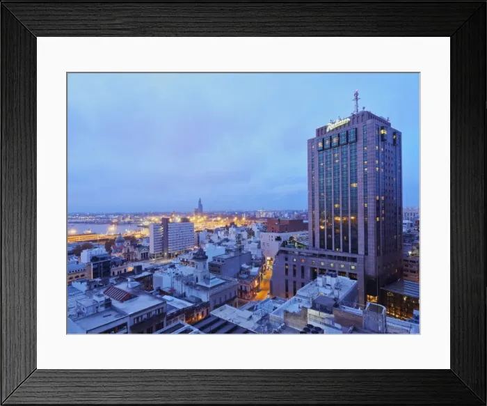 Framed Print : Elevated view of the City Centre with the characteristic building of the Radisson Hotel Framed Print : Elevated view of the City Centre with the characteristic building of the Radisson Hotel