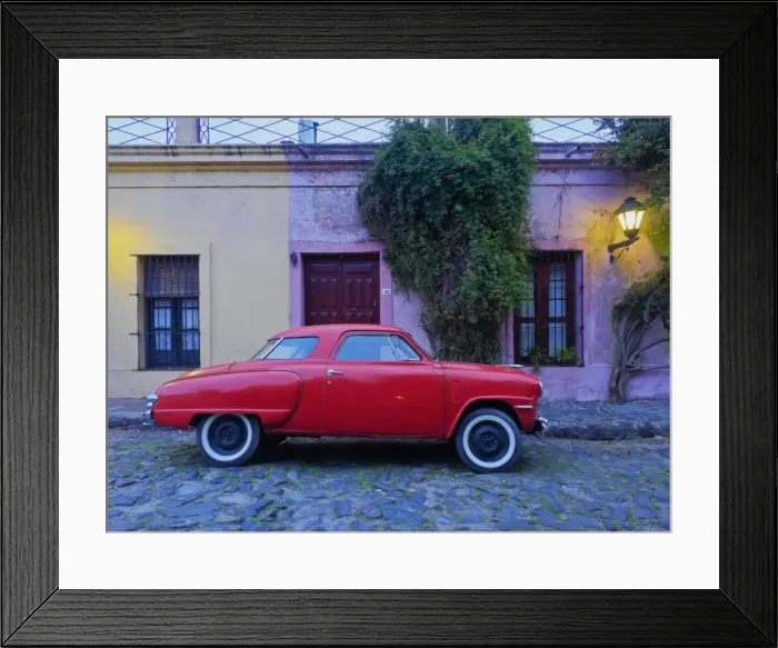 Framed Print : Vintage Studebaker car on a cobblestone lane of the historic quarter, Colonia del Sacramento Framed Print : Vintage Studebaker car on a cobblestone lane of the historic quarter, Colonia del Sacramento