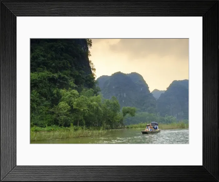 Framed Print : Boats in the karst landscapes of Tam Coc and Trang An in the Red River area, UNESCO