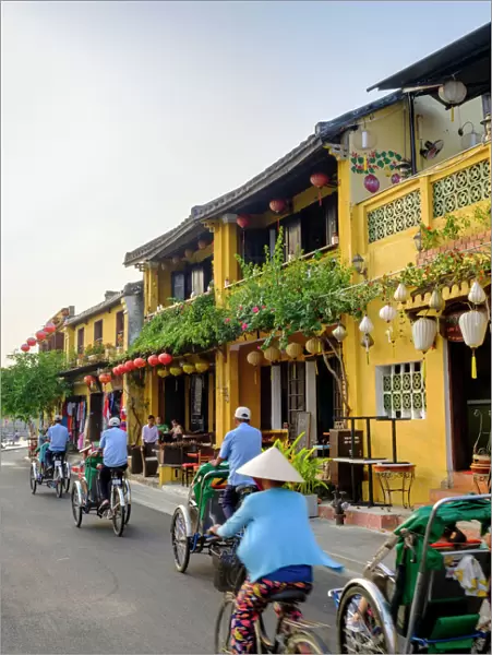 General view of shop houses and bicycles in Hoi An, Vietnam, Indochina, Southeast Asia