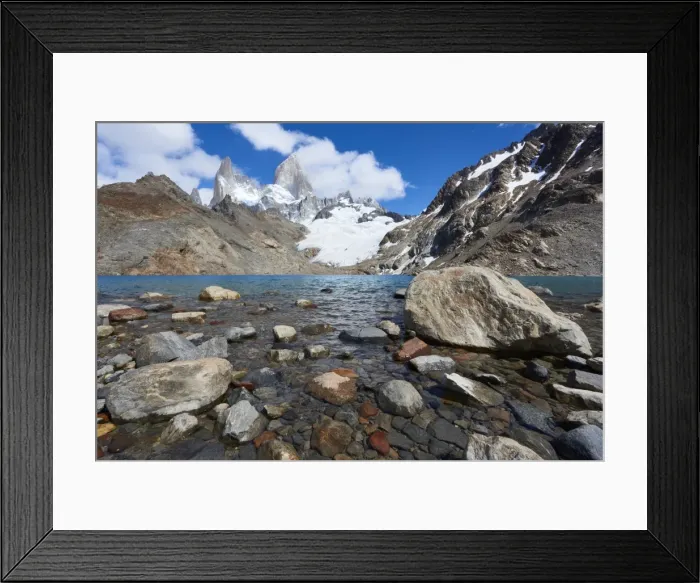 Framed Print : Stones seen through the water of Lago de los Tres featuring Monte Fitz Roy in the background Framed Print : Stones seen through the water of Lago de los Tres featuring Monte Fitz Roy in the background