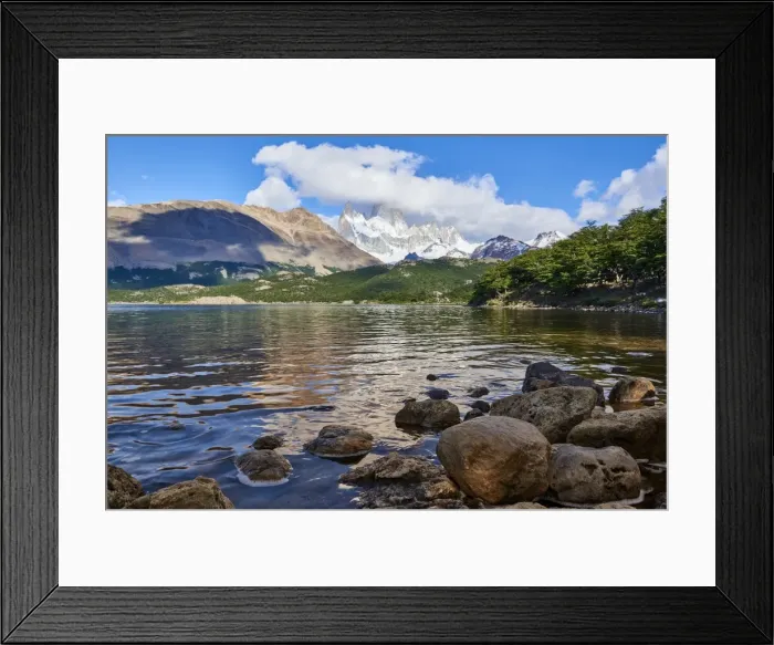 Framed Print : Wide angle shot of Capri Lagoon featuring Monte Fitz Roy in the background and rocks Framed Print : Wide angle shot of Capri Lagoon featuring Monte Fitz Roy in the background and rocks