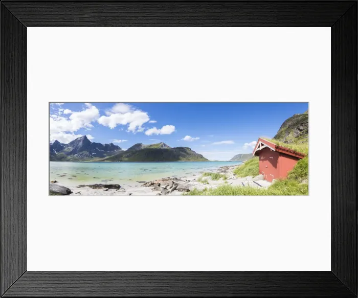 Framed Print : Panorama of the turquoise sea surrounded by peaks and typical house of fishermen Framed Print : Panorama of the turquoise sea surrounded by peaks and typical house of fishermen