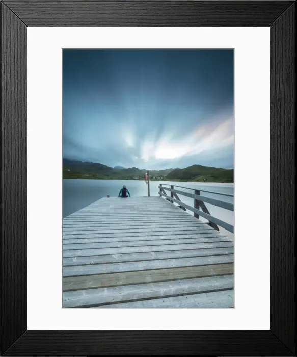 Framed Print : Hiker on wooden deck admires the sea illuminated by blue lights at night, Holdalsvatnet Framed Print : Hiker on wooden deck admires the sea illuminated by blue lights at night, Holdalsvatnet