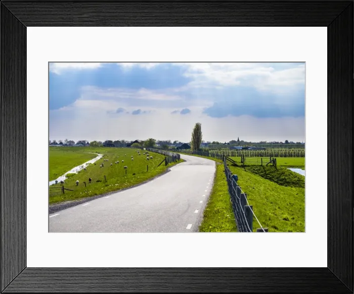 Framed Print : Winding rural road along the Zuiderdijk, Oosterleek, North Holland, Netherlands, Europe Framed Print : Winding rural road along the Zuiderdijk, Oosterleek, North Holland, Netherlands, Europe