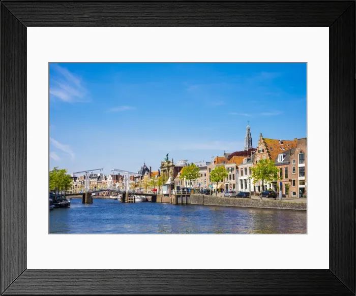 Framed Print : Buildings along the Spaarne River with Gravestenenbrug drawbridge, Haarlem, North Holland Framed Print : Buildings along the Spaarne River with Gravestenenbrug drawbridge, Haarlem, North Holland