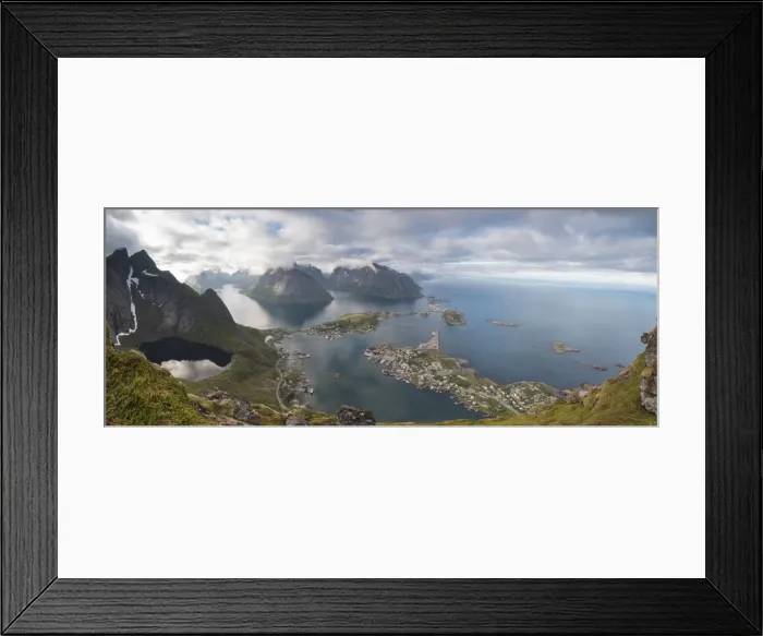 Framed Print : Panorama of the blue lake and sea framed by rocky peaks, Reinebringen, Moskenesoya Framed Print : Panorama of the blue lake and sea framed by rocky peaks, Reinebringen, Moskenesoya