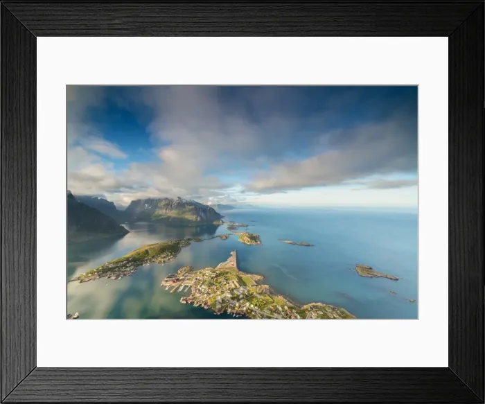 Framed Print : Blue sky and clouds frame the turquoise sea and the typical village, Reinebringen Framed Print : Blue sky and clouds frame the turquoise sea and the typical village, Reinebringen