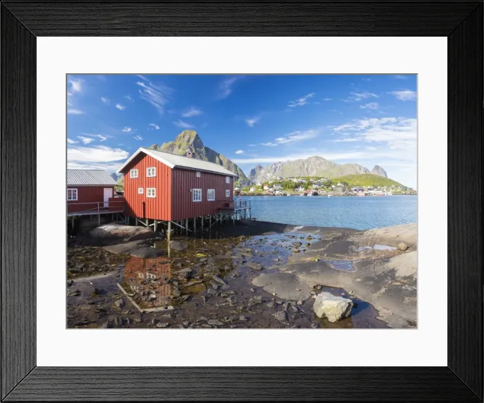 Framed Print : Typical house of fishermen called Rorbu reflected in blue sea, Reine, Moskenesoya Framed Print : Typical house of fishermen called Rorbu reflected in blue sea, Reine, Moskenesoya