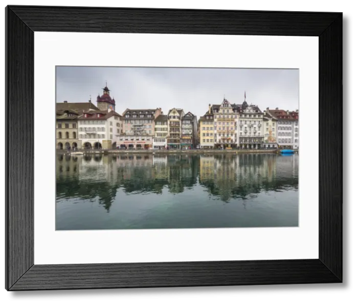 Framed Print : The typical buildings of the old medieval town are reflected in River Reuss, Lucerne Framed Print : The typical buildings of the old medieval town are reflected in River Reuss, Lucerne