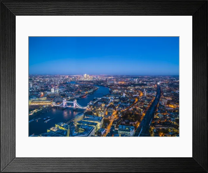 Framed Print : High view of London skyline at dusk along the River Thames from Tower Bridge to Canary Wharf Framed Print : High view of London skyline at dusk along the River Thames from Tower Bridge to Canary Wharf