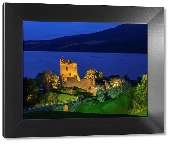 Twilight view of Urquhart Castle and Loch Ness, Highlands, Scotland, United Kingdom