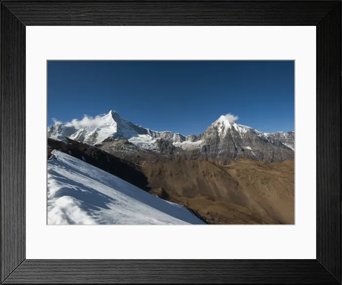 Framed Print : Snow on the Nyile La, a 4950m pass, and the peak of Jitchu Drake at 6714m in the distance Framed Print : Snow on the Nyile La, a 4950m pass, and the peak of Jitchu Drake at 6714m in the distance