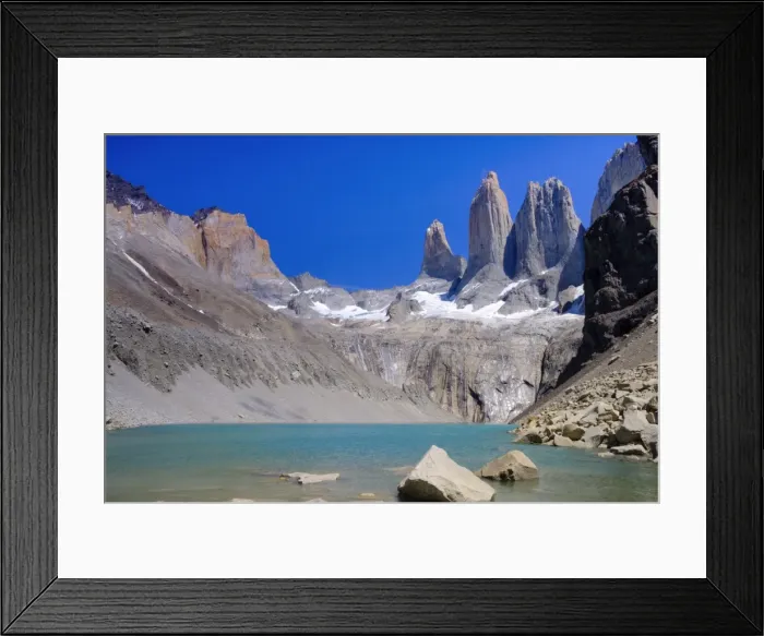Framed Print : A glacial lake and the rock towers that give the Torres del Paine range its name Framed Print : A glacial lake and the rock towers that give the Torres del Paine range its name