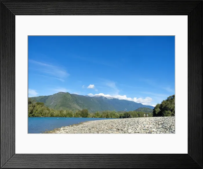 Framed Print : Fishermen walking along a shingle beach next to the trout-filled Puelo River in Northern Patagonia Framed Print : Fishermen walking along a shingle beach next to the trout-filled Puelo River in Northern Patagonia