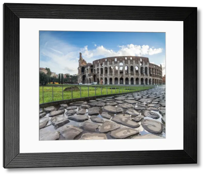 Framed Print : Blue sky at sunrise frames the ancient Colosseum (Flavian Amphitheatre), UNESCO World Heritage Site Framed Print : Blue sky at sunrise frames the ancient Colosseum (Flavian Amphitheatre), UNESCO World Heritage Site