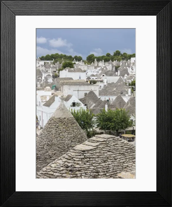 Framed Print : View of the typical Trulli built with dry stone with a conical roof, Alberobello Framed Print : View of the typical Trulli built with dry stone with a conical roof, Alberobello