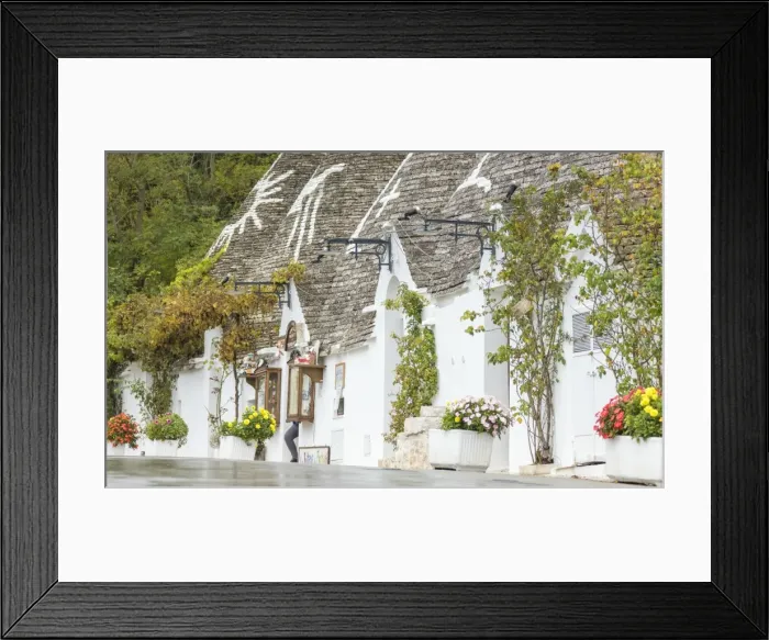 Framed Print : The traditional huts called Trulli built with dry stone with a conical roof, Alberobello Framed Print : The traditional huts called Trulli built with dry stone with a conical roof, Alberobello