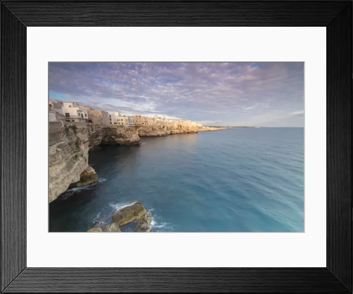Framed Print : Sunrise on the turquoise sea framed by old town perched on the rocks, Polignano a Mare Framed Print : Sunrise on the turquoise sea framed by old town perched on the rocks, Polignano a Mare