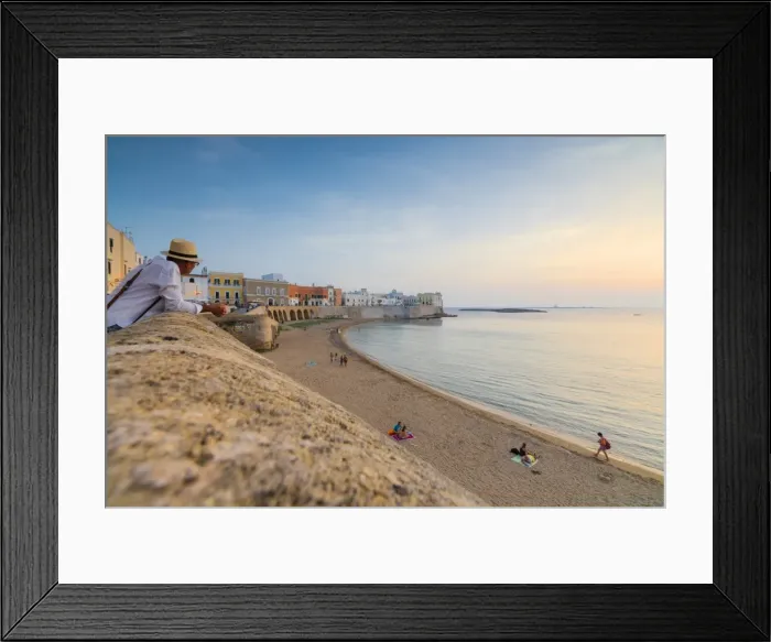 Framed Print : Sunset frames the beach and the turquoise sea, Gallipoli, Province of Lecce, Apulia