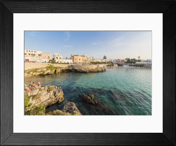 Framed Print : Turquoise sea and cliffs frame the fishing village of Santa Maria al Bagno Gallipoli Framed Print : Turquoise sea and cliffs frame the fishing village of Santa Maria al Bagno Gallipoli