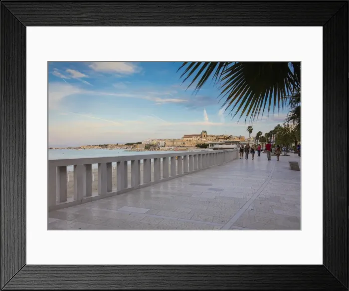 Framed Print : Tourists on the promenade with the medieval old town in the background, Otranto, Province of Lecce Framed Print : Tourists on the promenade with the medieval old town in the background, Otranto, Province of Lecce